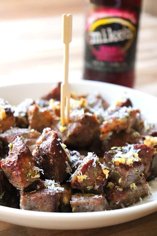 Cheesy Garlicky Steak Bites with a toothpick