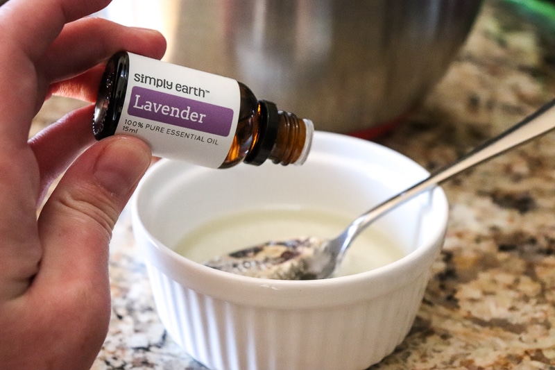 Lavender essential oil and coconut oil for homemade lavender bath bombs 